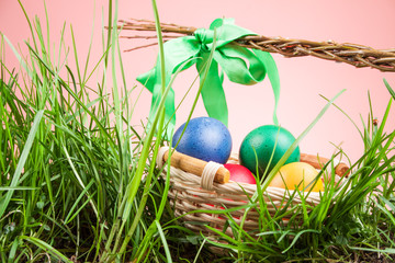 Easter basket with colored eggs