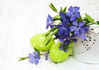 bucket with  periwinkle and easter eggs