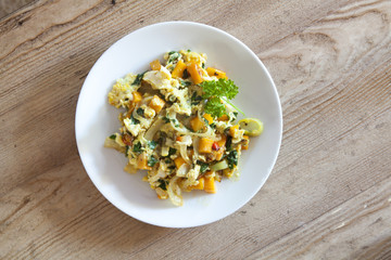 Scrambled eggs with kale and squash