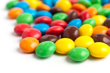 Multicolored candies isolated on white