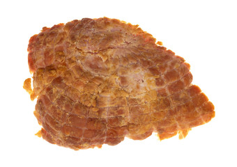 Bottom of a baked ham end isolated on a white background