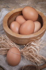Eggs in wooden bowl