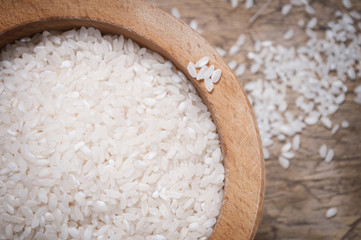 Rice in wooden bowl, close up