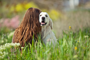 Woman with dog on nature 