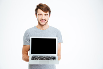 Man showing blank laptop computer screen