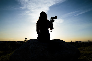 Female silhouette against the sky