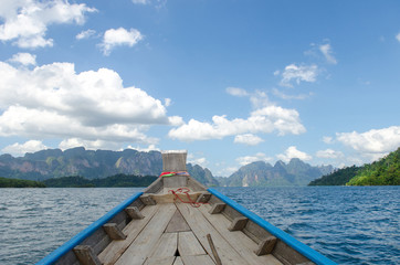 Beautiful mountains behind fog Ratchaprapha Dam at Khao Sok Nati