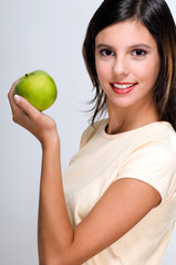 Woman eating an apple