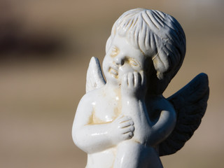 White angel statue in the cemetery