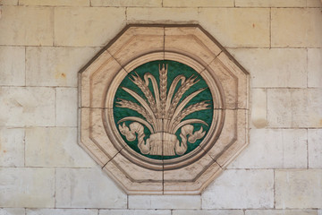 Bas-relief of the Soviet era in the building of the pavilion. Ki