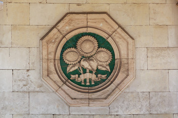 Bas-relief of the Soviet era in the building of the pavilion. Ki