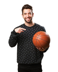 young man playing basket