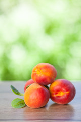 fresh apricot on wood table. Natural background. Selective focus.