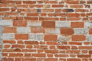Old wall of red and white bricks