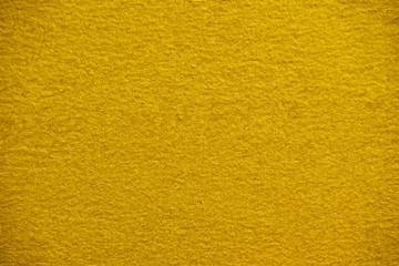Golden yellow pearl painted surface