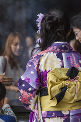 Japanese women wear a traditional dress called Kimono for Sakura