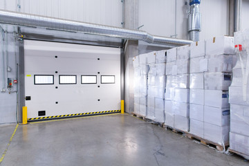 warehouse door or gate and cargo boxes