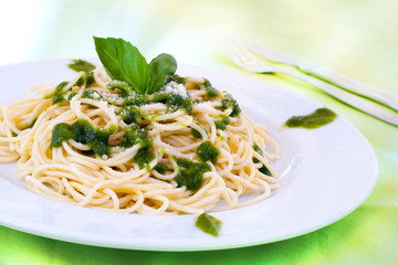 Spaghetti with pesto sauce.