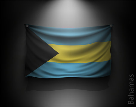 waving flag bahamas on a dark wall