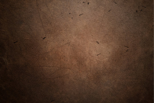 Worn leather with stains texture background