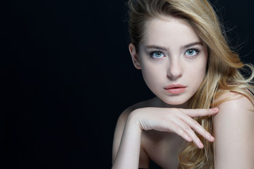 Beautiful young lady with make up face. Close-up of an attractive girl of European appearance on...