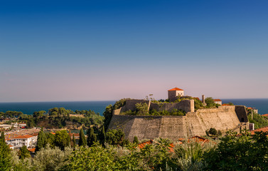 Ulcinj ancient fortress and old town at sunset