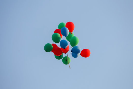 Colorful balloons in sky