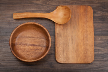 Empty vintage cutting board on planks food background concept