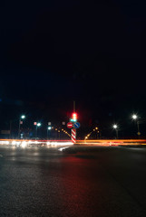 moving car with blur light through city night