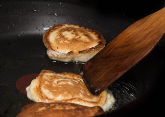 delicious homemade pancakes baking in the pan