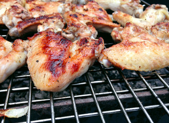Cooking chicken wings grille