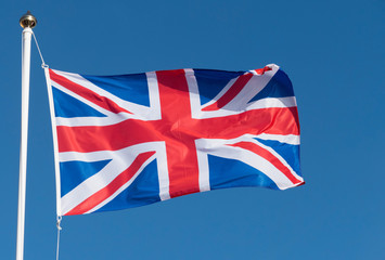 UK Union Flag of Great Britain blowing in the wind.