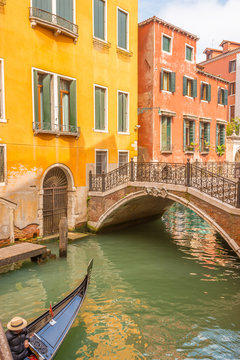 Lovely view on the bridge and the canal of Venice.