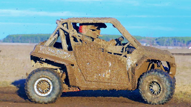 Utv car racing. Mud track.