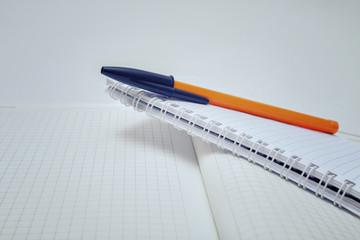 Ballpen and notebook