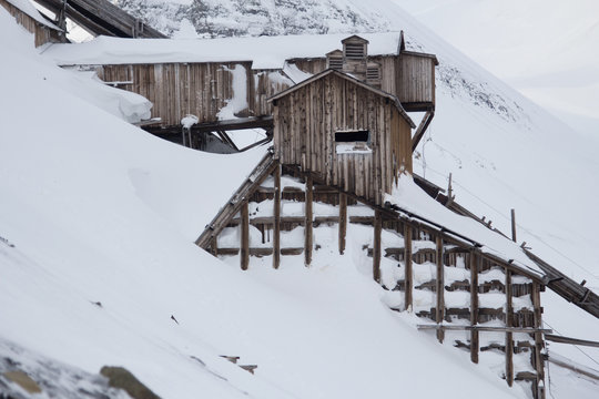 Exterior of an abandoned Arctic coal mine buildings in Longyearbyen