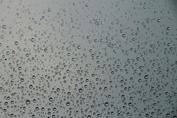Raindrops on window , rainy day 
