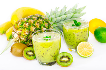 Smoothies of kiwi and pineapple on the table