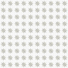 Golden snowy pattern. Seamless golden stars ornament against the snow backdrop. Made by means of openclipart.org elements.