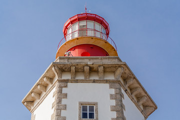 Fototapeta na wymiar Close-up on the Lantern Room of the Espichel Cape lighthouse. Built during the 18th century is one of the oldest lighthouses in Portugal and insures safety in the Atlantic Ocean. Sesimbra, Portugal.