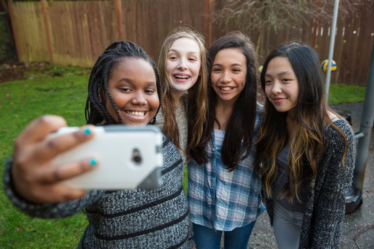 Group of kids taking a selfie