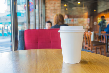 White coffee cup in coffee shop