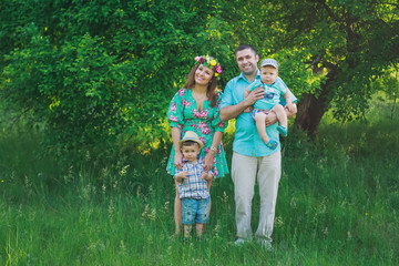 Happy family resting in nature