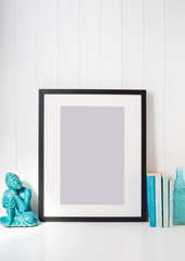 Black picture frame on desk