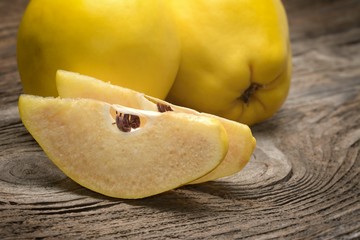 Quince on wooden table