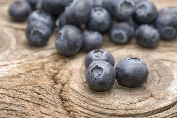 blueberries on a wooden background