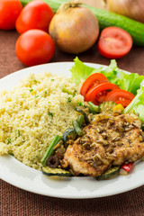 Chicken steak with couscous