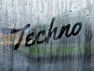 Techno written on a foggy window - 102868788