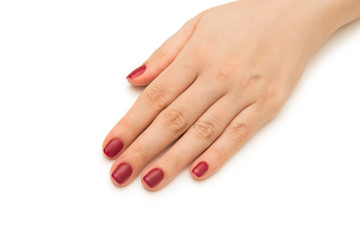 Woman hands with red nail isolated on white