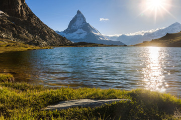 View of Matterhorn Mountain with lake at Zermatt - obrazy, fototapety, plakaty
